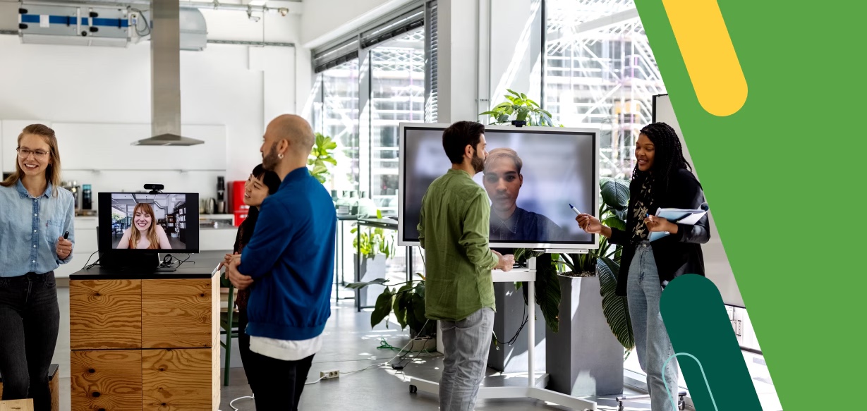 Cisco Meraki team collaborating in an office